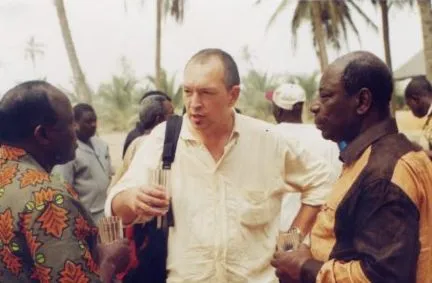 Talking with local officials in Ouidah, Benin, Quintessence festival 2005
